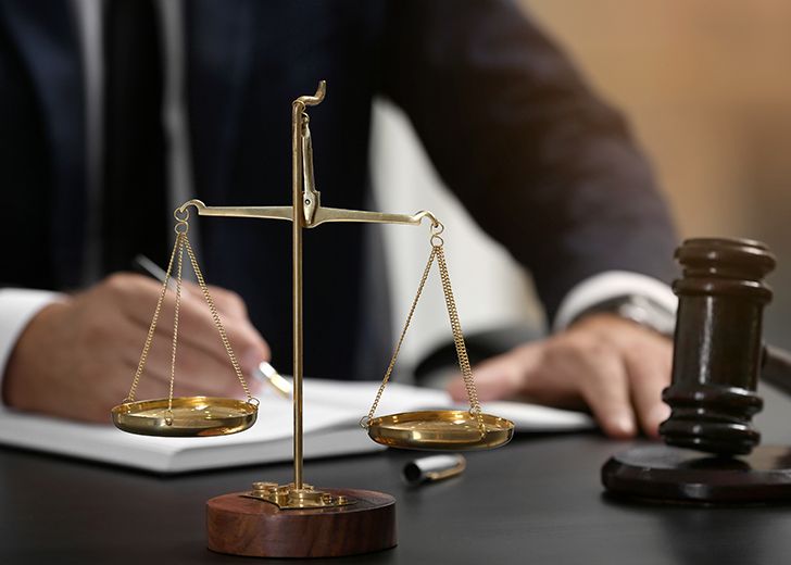 Gavel and balance on attorney desk
