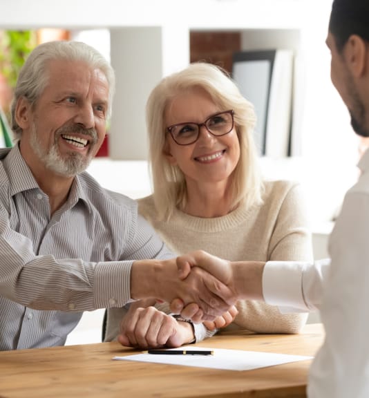 gentleman and businessman shaking hands