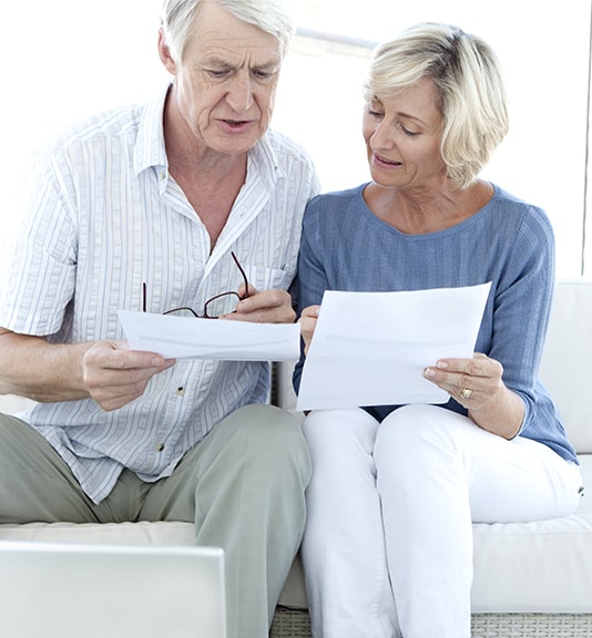 couple looking over paperwork