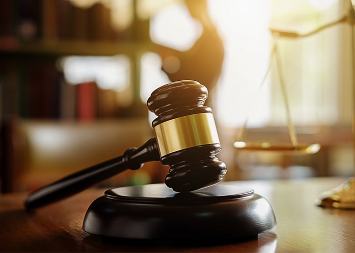 lawyer gavel sitting on desk