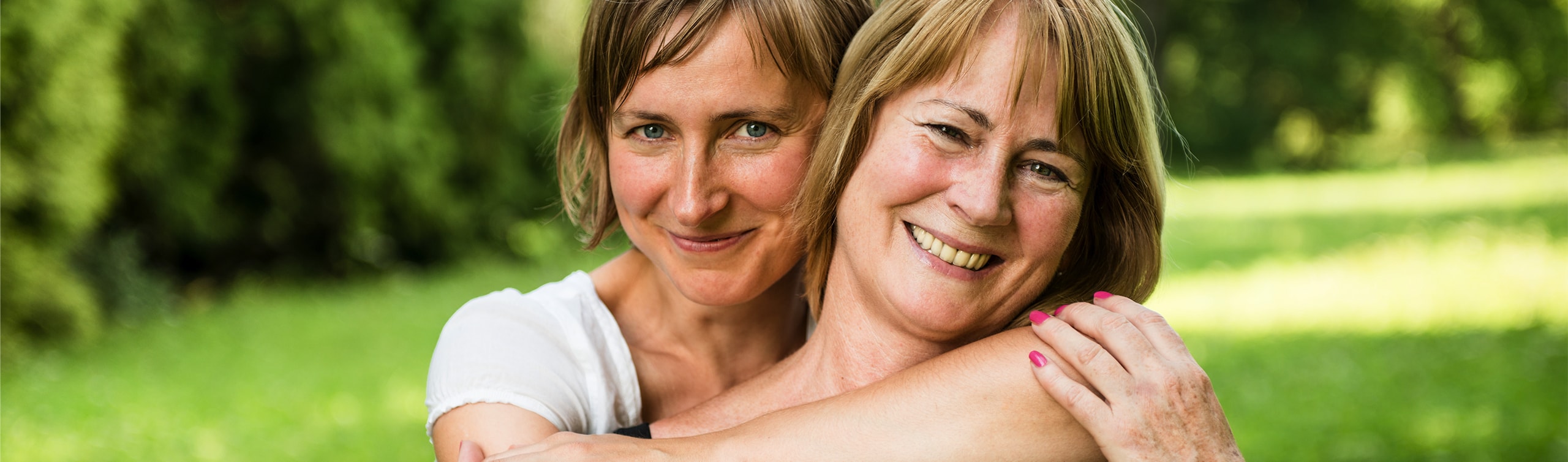 two woman smiling