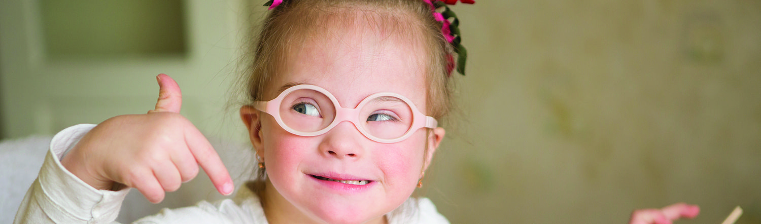 close-up of young disabled child smiling