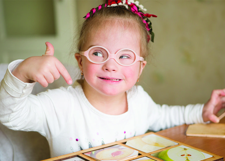 close-up of young disabled girl smiling