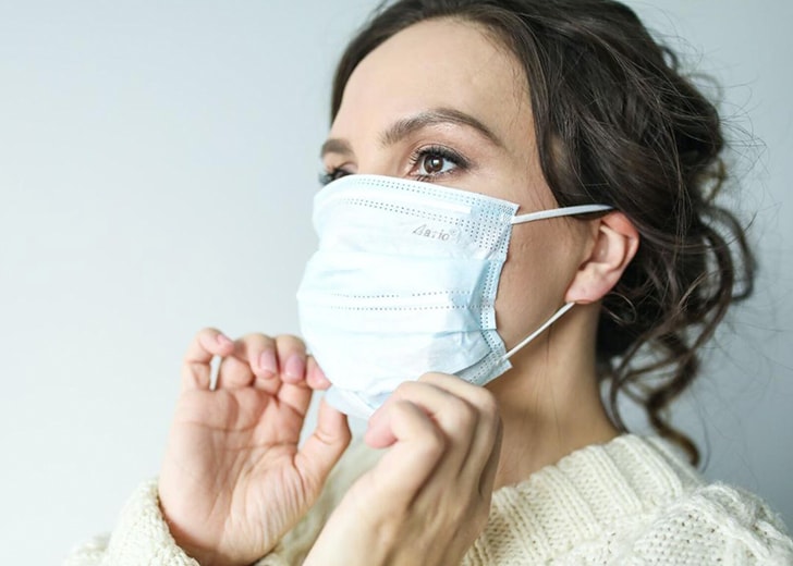 woman wearing a mask