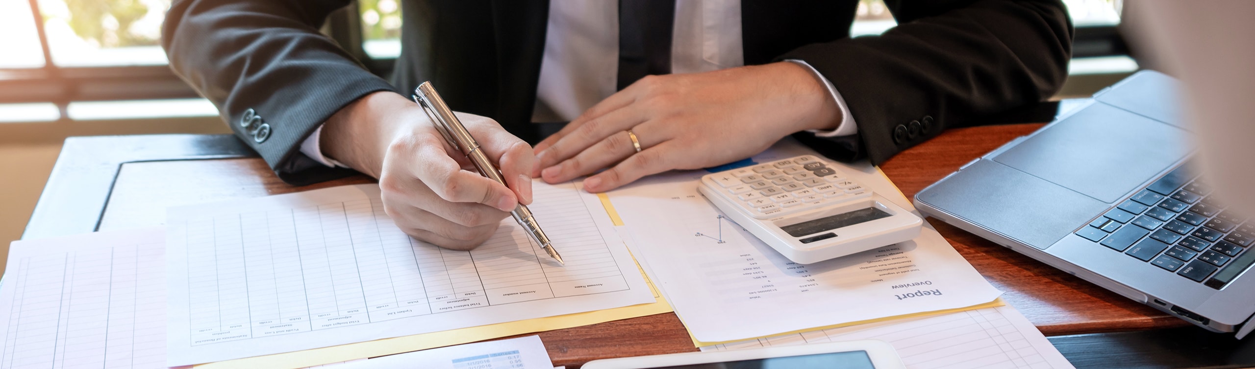 close up of gentleman going of tax planning